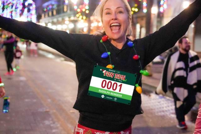 Woman running in Holiday Fun Run