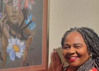 Museum curator in front of artwork