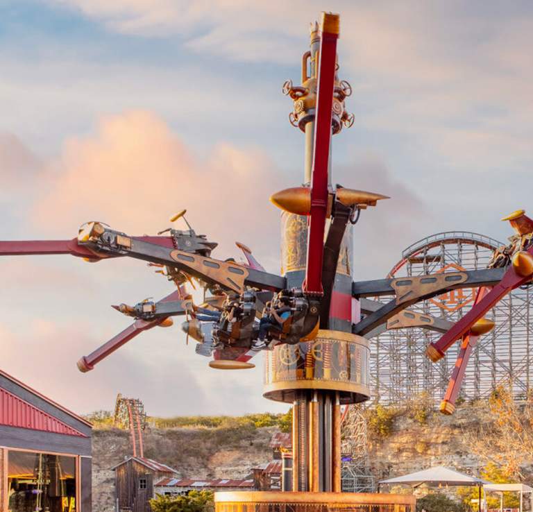 Aerial ride in front of roller coaster